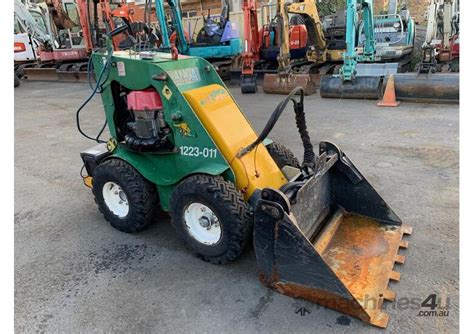 stand on skid steer|used stand behind skid steer.